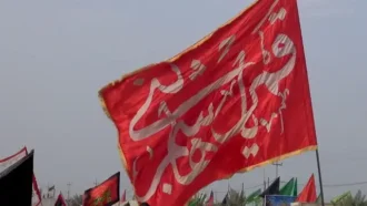 پرچم افراشته یا قمر بنی هاشم در آسمان